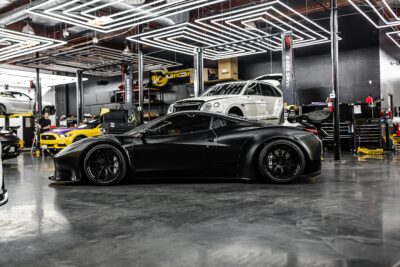 Ghid de instalare downpipe pe mașină turbo – mecanic profesionist montează evacuare sport ASM Tuning România