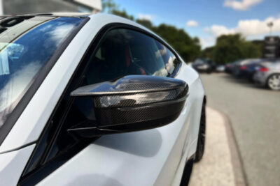 Capace oglinzi laterale montate pe BMW M4 G82 pentru aspect si tuning auto